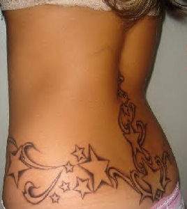 I got a So called Tramp stamp.. But really Im not a tramp. I just get what I want.